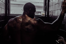 Load image into Gallery viewer, Beautiful Black man with a beard and muscles taking a hot shower in the NIGHTCAP luxury scented candle campaign for HAUME. Notes of citrus, amber and musk.
